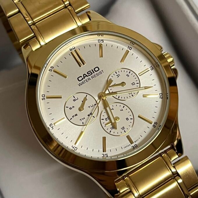 Montre CASIO Homme - Bracelet DoRée En Acier Inoxydable - Cadran Blanc - 12 Mois De Garantie - MTP-V300G-7AUDF