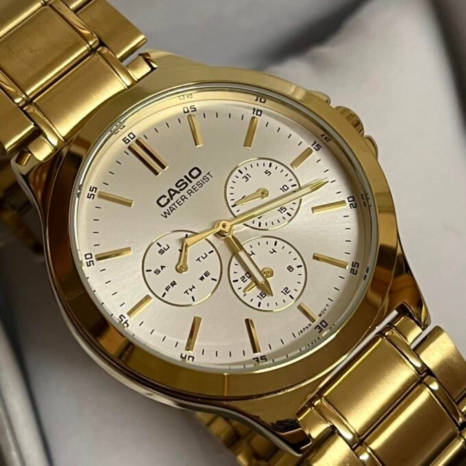 Montre CASIO Homme - Bracelet DoRée En Acier Inoxydable - Cadran Blanc - 12 Mois De Garantie - MTP-V300G-7AUDF