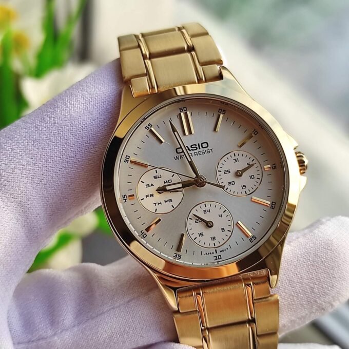 Montre CASIO Femme - Bracelet DoRée En Acier Inoxydable - Cadran Blanc - 12 Mois De Garantie - LTP-V300G-7AUDF